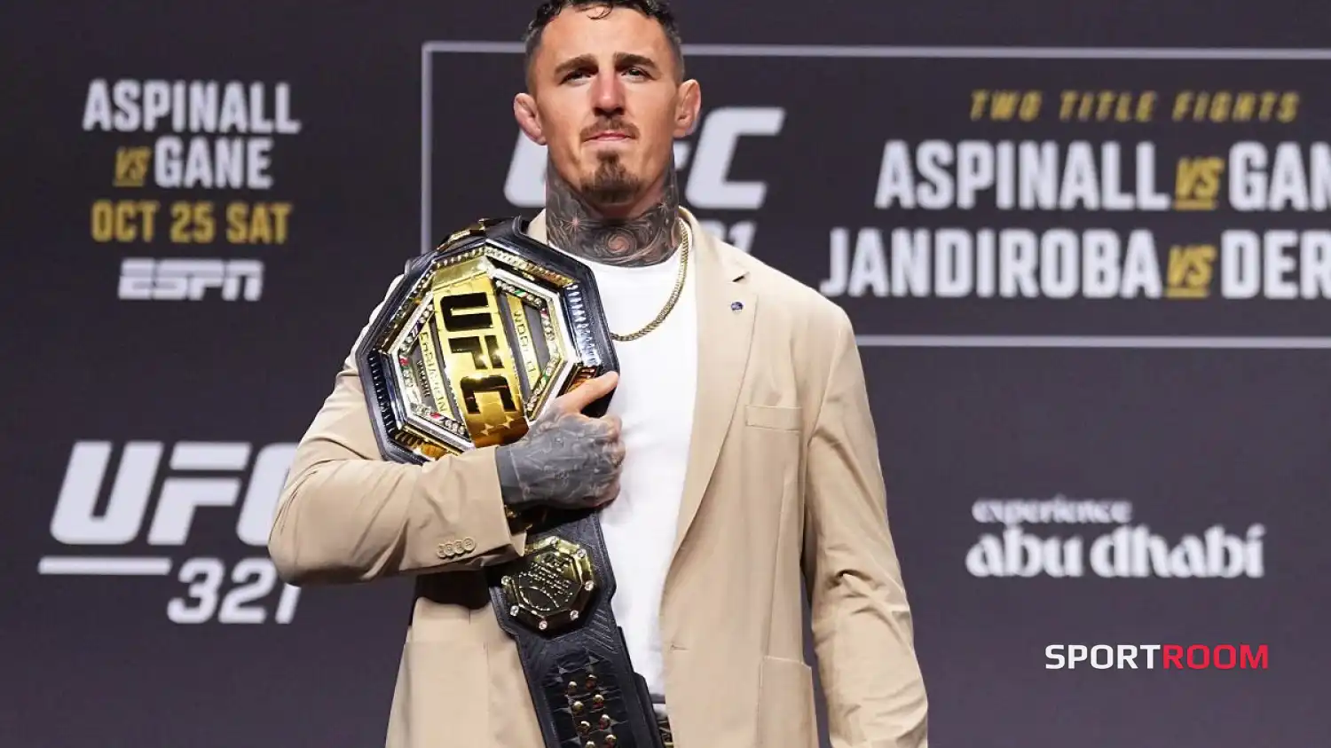 Том Аспиналл UFC-дің ауыр салмақтағы чемпиондық белбеуінен бас тартты